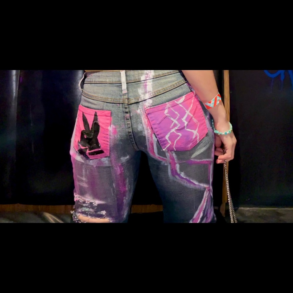 Size 7 One of a kind upcycled playboy bunny/ pink lightning bell bottoms.